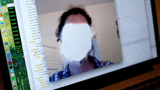 Video of man's face with computer filters applied to distort face